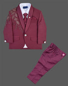 Boys tailored three-piece suit set featuring structured blazer, button-down shirt, and dress pant for events.

