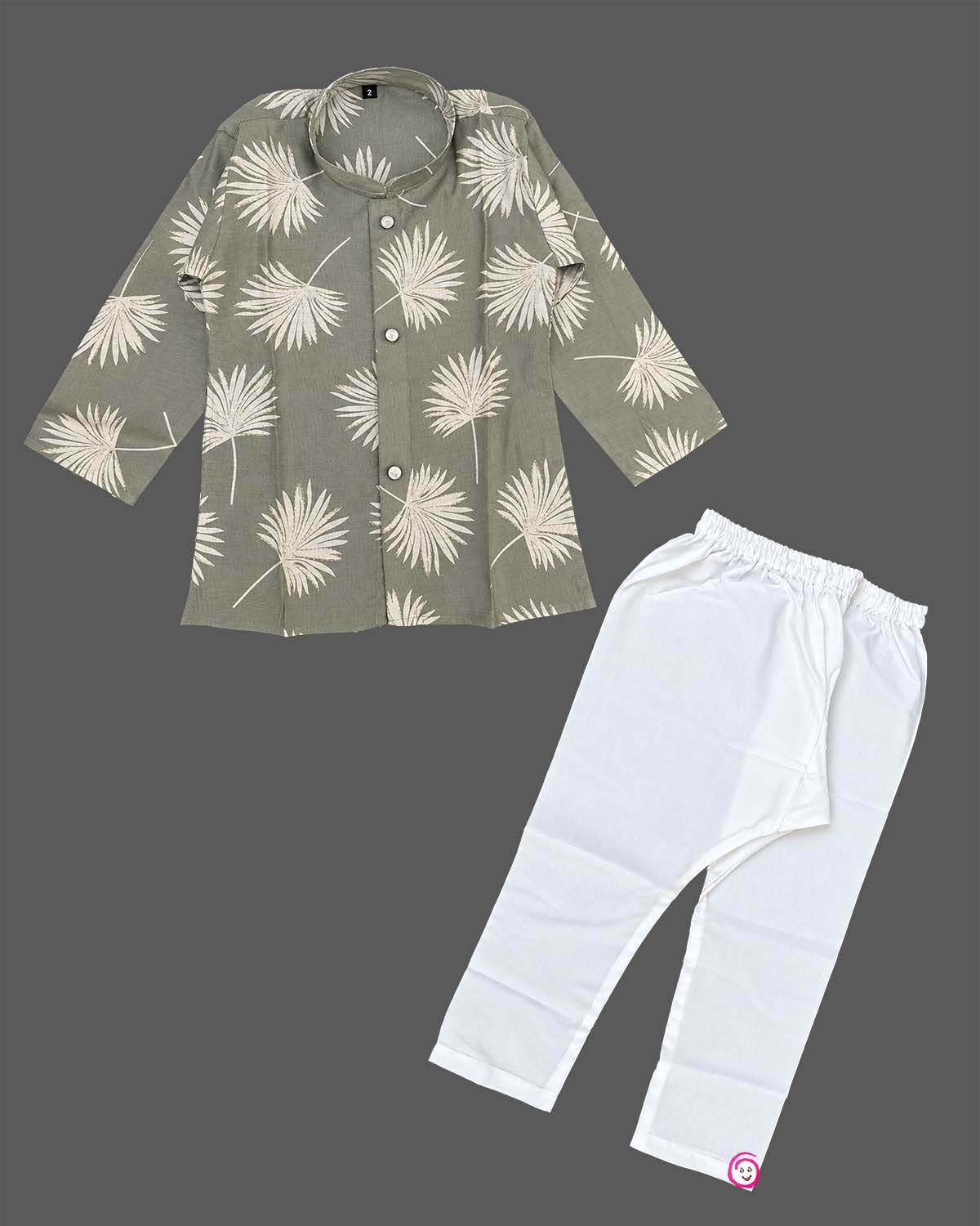 Baby boy ethnic kurta pant set featuring botanical leaf prints, mandarin collar, and roll-up sleeves.