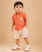 Orange premium muslin cotton shirt and shorts set with swinging teddy bear embroidery for daycare and family trips