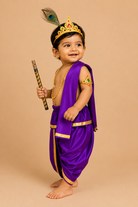 Infant Kanha outfit featuring dhoti stole mukut feather and flute for Gokulashtami celebrations