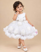Toddler white net party gown with sequin bodice and bow applique