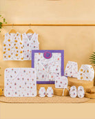 Newborn baby essential clothing gift set featuring cotton sleeveless tops, cloth nappies, bonnet, hooded towel, mittens, and booties
