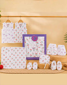 Complete infant layette gift hamper with sleeveless tops cloth nappies hooded swaddle sheet ruffled bonnet cap mittens and booties