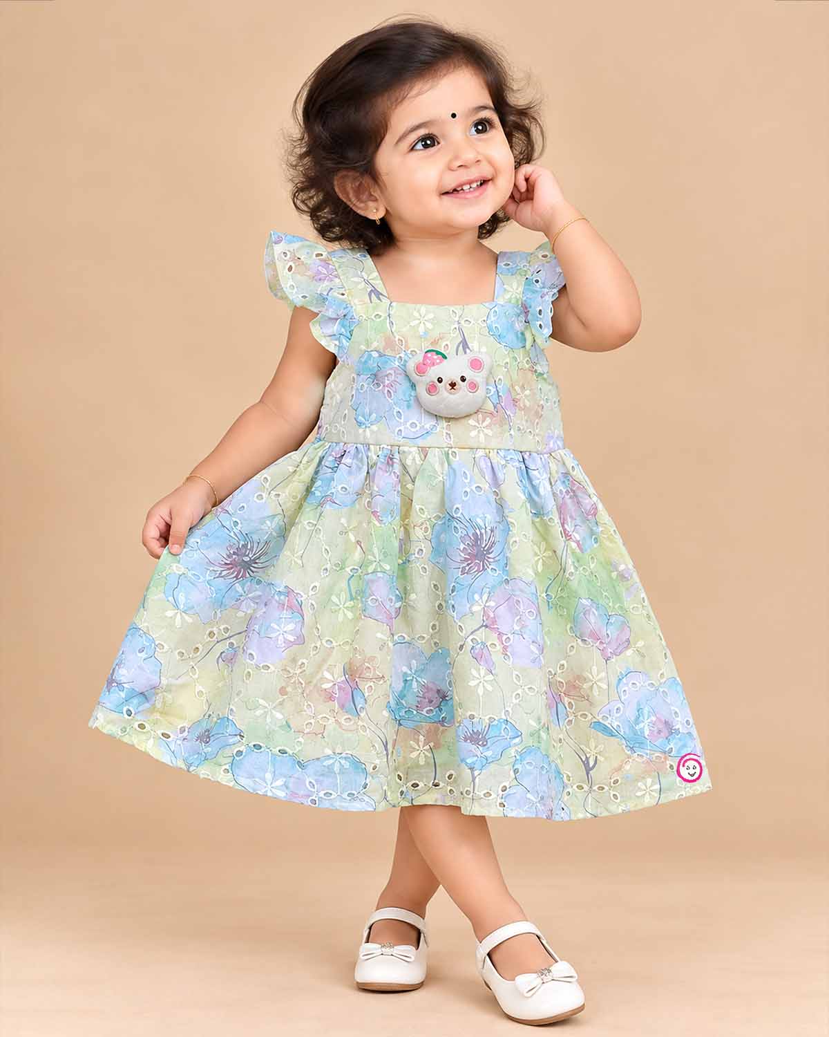 Pastel green schiffli floral casual frock for toddler girls with teddy patch