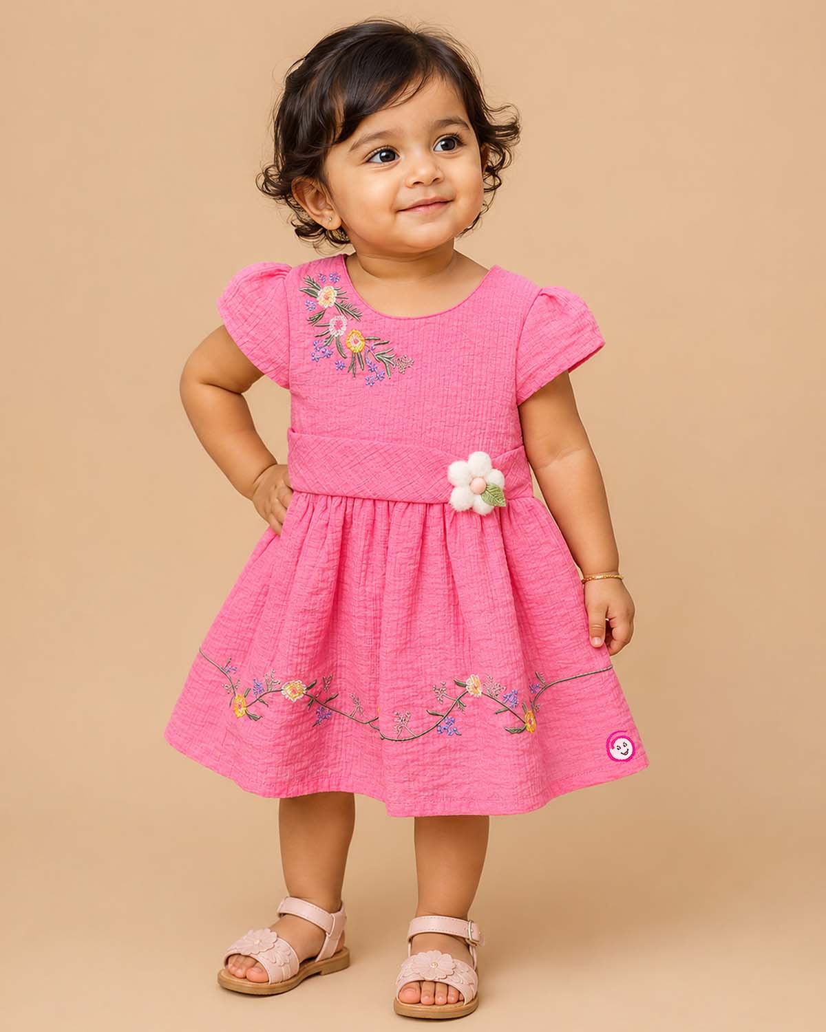 Little princess cotton casual frock featuring floral embroidery, cap sleeves, and decorative waist accent for everyday comfort