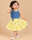 Girls blue denim strappy top with ruffle flower and yellow net embroidered skirt set