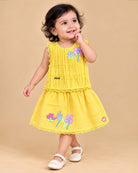 Toddler yellow cotton schiffli top and skirt set with floral appliques