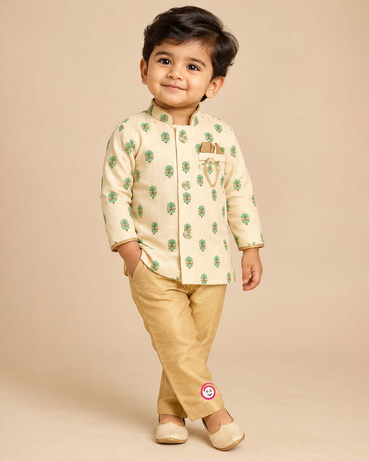 Boys silk blend floral motif sherwani set with mandarin collar and elasticated pyjamas for festive ceremonies and wedding events.