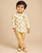 Boys silk blend floral motif sherwani set with mandarin collar and elasticated pyjamas for festive ceremonies and wedding events.