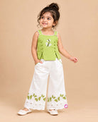 Sleeveless embroidered top with butterfly motifs and matching pleated pants with scalloped hems