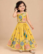 Embroidered lehenga choli for kids featuring scalloped floral sequin work and drawstring tassel ties