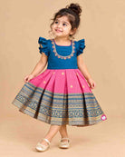 Baby Girl Silk Cotton Frock with Pattu Pavadai traditional border and embroidered neck for festive ethnic wear