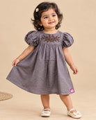 Baby girl embroidered frock with puff sleeves and chest floral detail for casual events