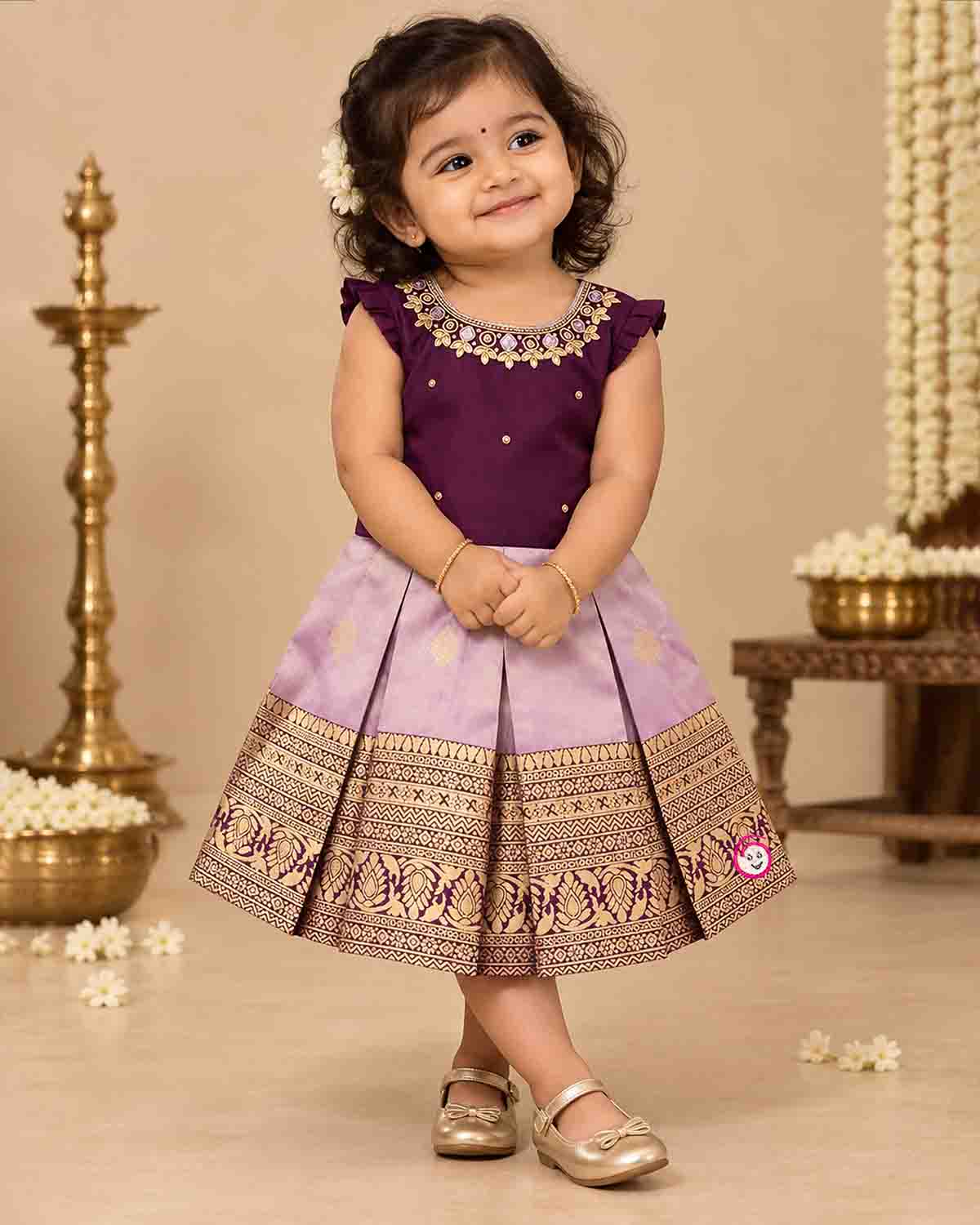 Girls silk embellished traditional frock featuring stone neckline handwork and zari pleated skirt