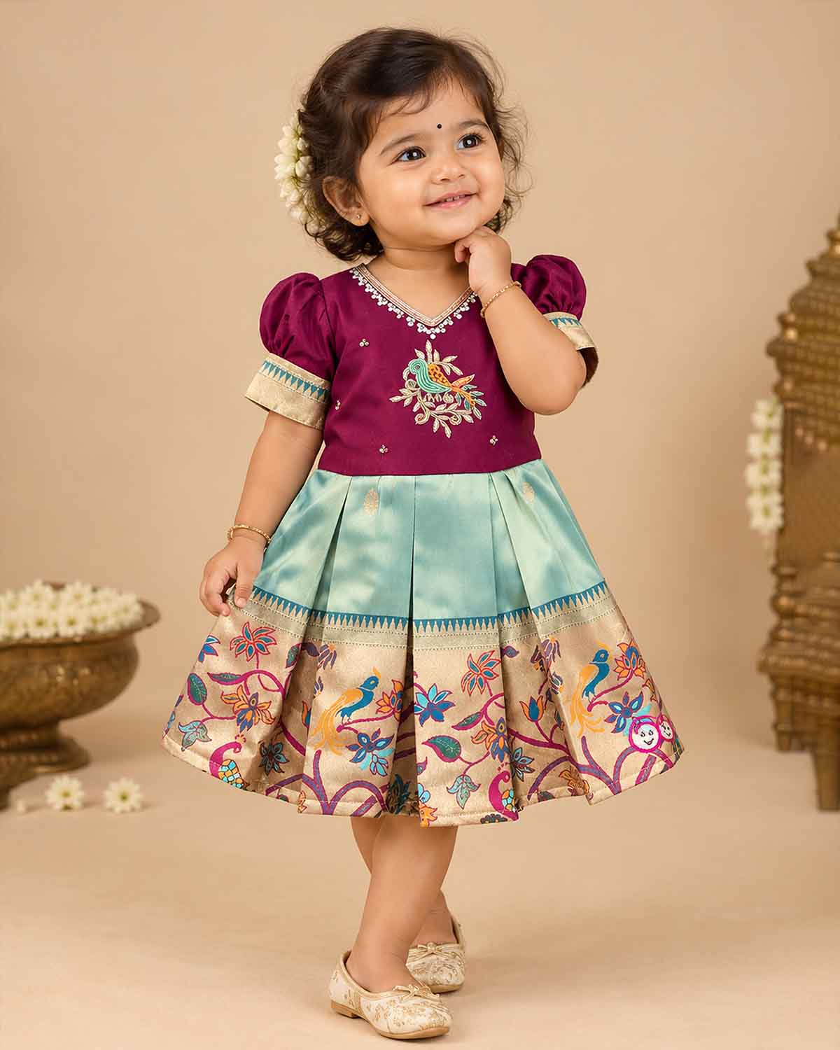 Little princess art silk traditional frock featuring peacock embroidery and zari woven hemcś