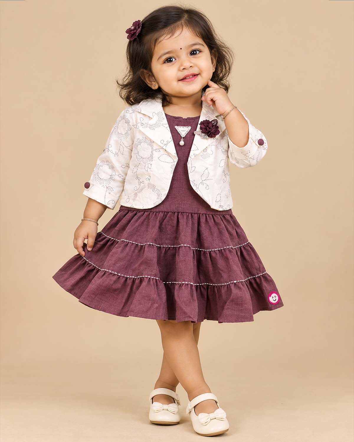 Little princess western layered frock set featuring a tiered dress with an embroidered crop jacket for celebrations.