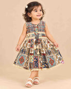 Toddler printed cotton frock with smocked neck and front lace tie ups for casual outing and birthday celebration