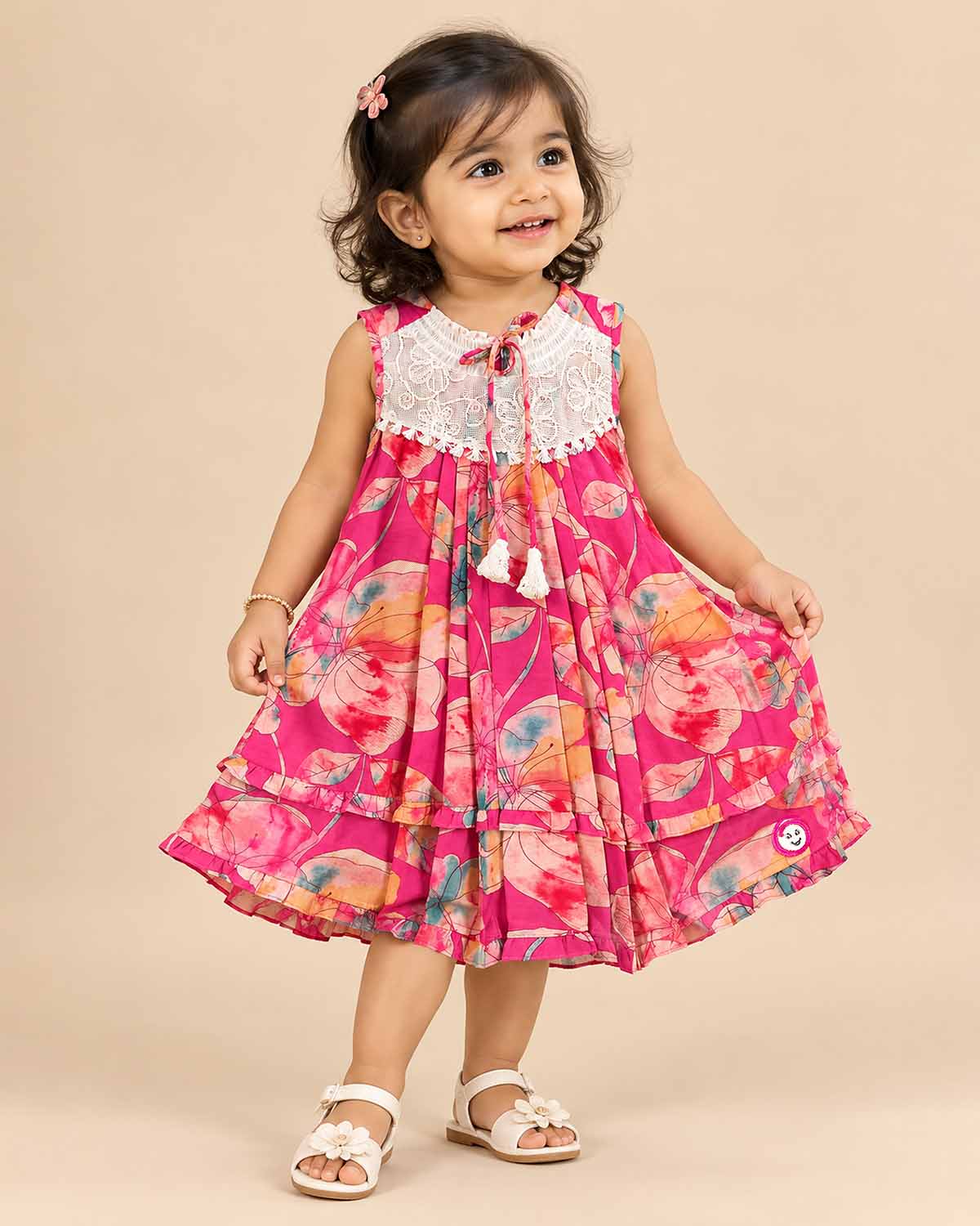 Infant floral printed frock with lace yoke insert and tassel tie up for birthday party and summer outing