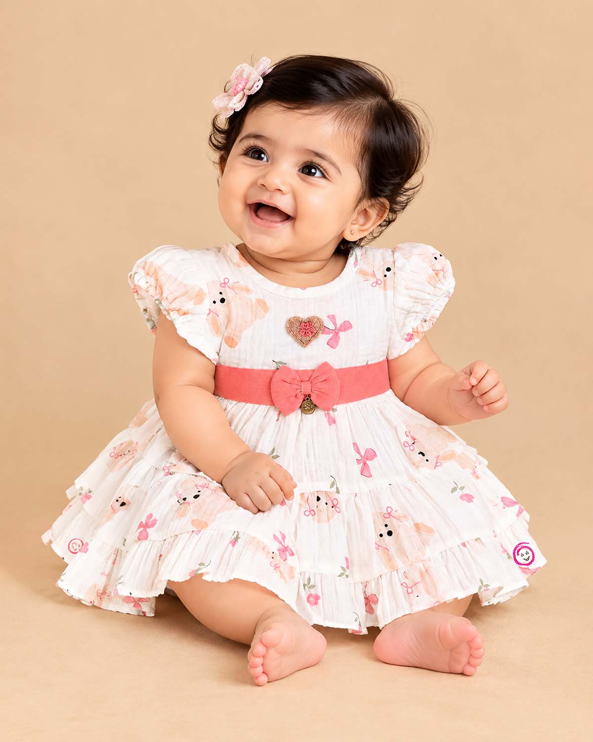 Infants frock with cute bunny print, waist bow, and ruffled skirt for baby girls