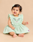 Light green baby girl infants frock with floral embroidery and frill sleeve