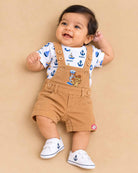 Boys dungaree set with nautical printed round neck t-shirt and light brown dungaree shorts