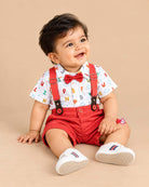 Charming infant suspender set with printed shirt and bow for party wear