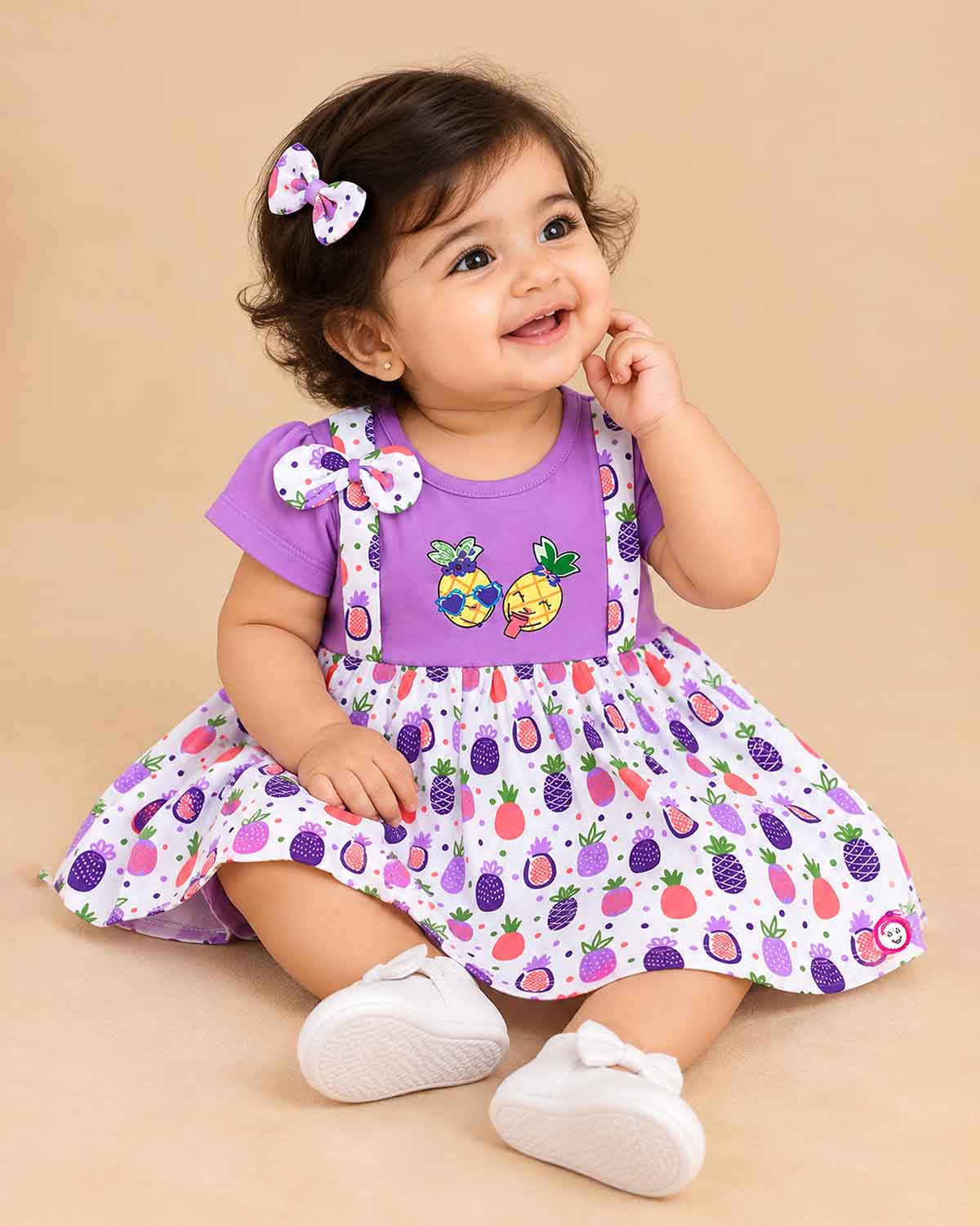 Infant cotton frock with short sleeves and pinafore strap detailing for daily wear