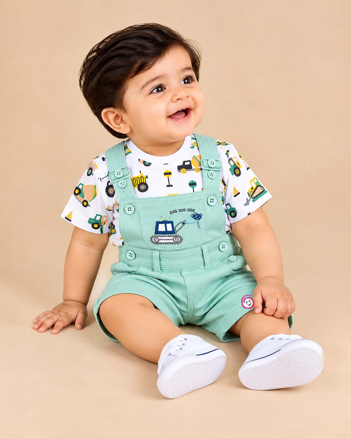 Baby boys printed t-shirt and light green short dungaree set with excavator graphic