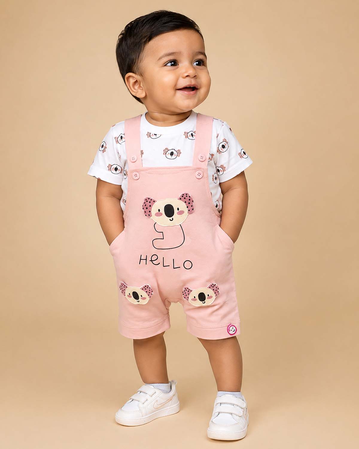 Playful young prince koala head printed short sleeve t-shirt with 3D animal applique bib shorts