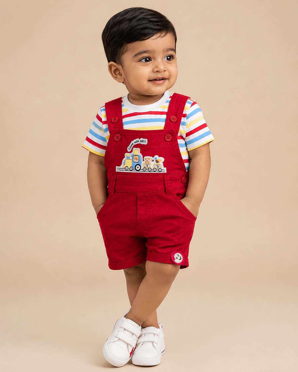 Trendy young prince multi striped tee with embroidered train bib shorts for casual outings