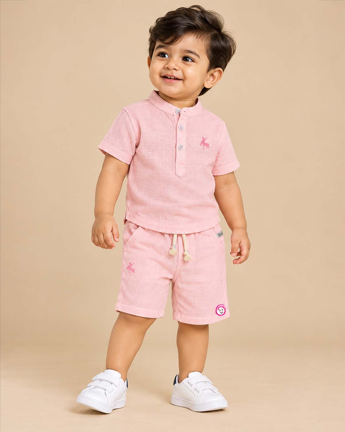 Textured collar shirt and shorts set styled as baby boy western wear with embroidered chest motif.