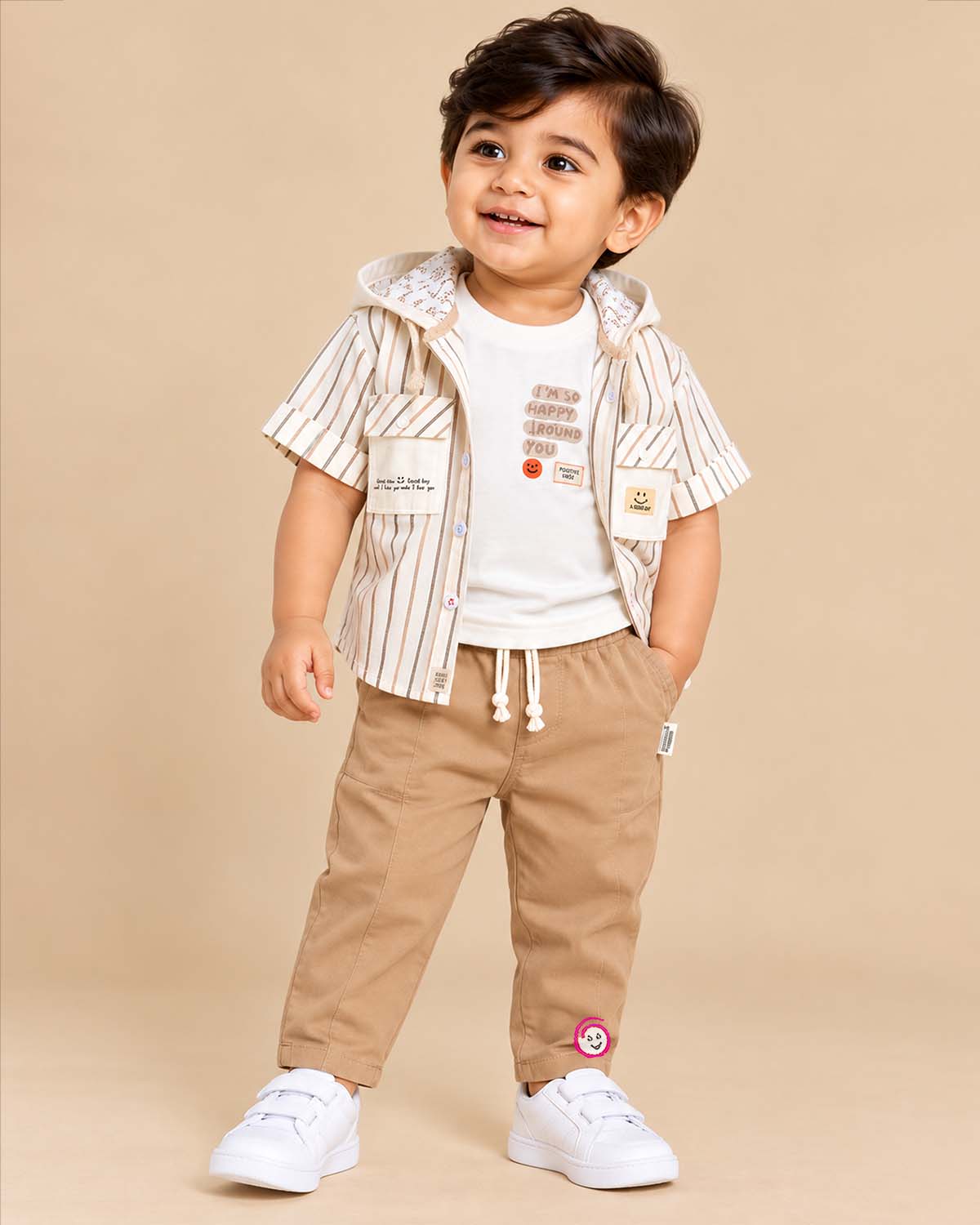 Toddler wearing striped hooded button down shirt and pant set as an western dress for boys.