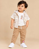 Toddler wearing striped hooded button down shirt and pant set as an western dress for boys.
