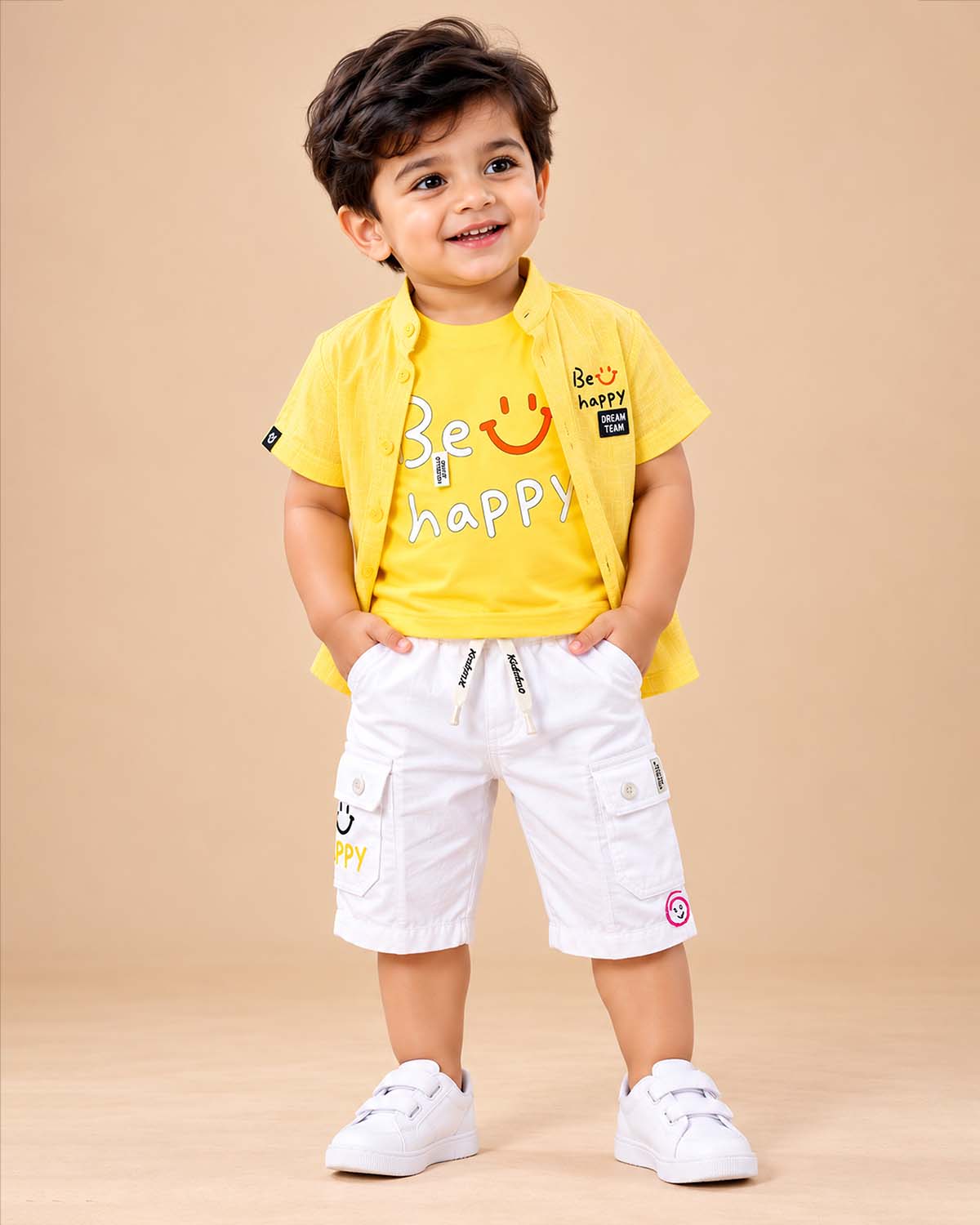 Toddler wearing short-sleeve button-down shirt and shorts designed for kids western wear.