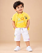 Toddler wearing short-sleeve button-down shirt and shorts designed for kids western wear.