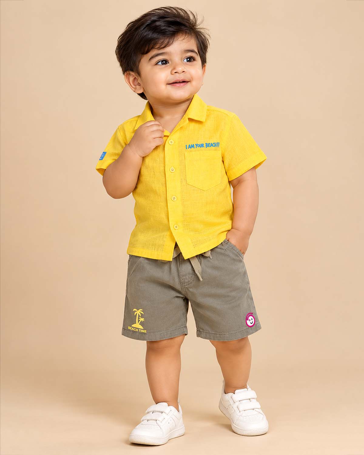 Toddler wearing a baby Western wear dress featuring collar button down shirt and drawstring utility shorts.
