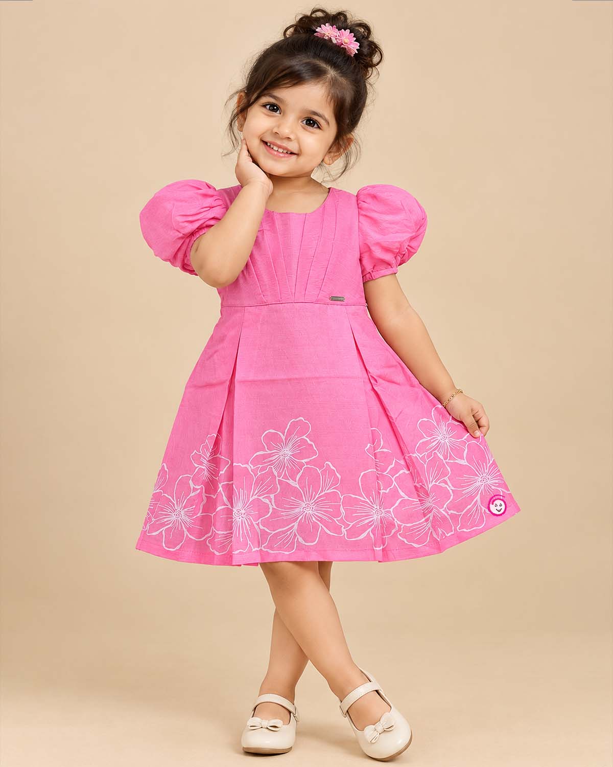 Pink floral cotton dress with puff sleeves for young girls casual wear