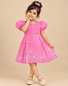 Pink floral cotton dress with puff sleeves for young girls casual wear
