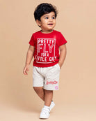 Red graphic t-shirt with Pretty Fly typography print and light grey elasticated shorts baby boy top and shorts set for summer vacations, playdates, and park outings