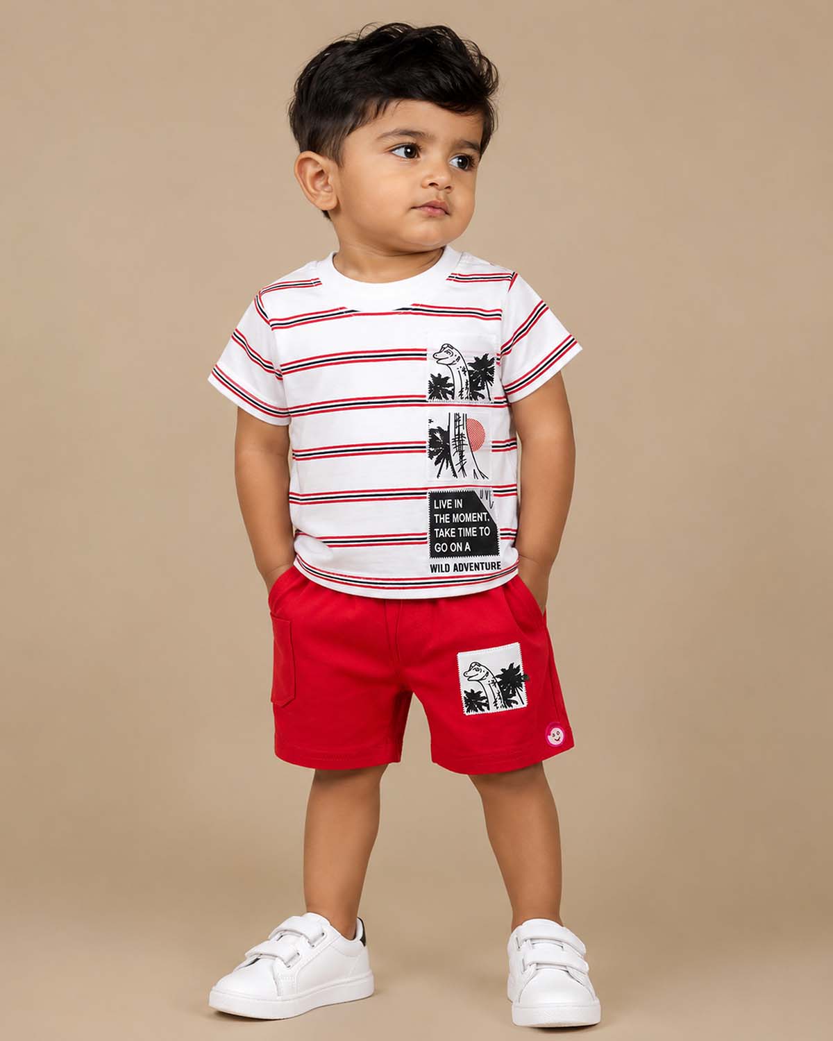 White striped t-shirt with graphic patches and red elasticated shorts baby boy top and shorts set for summer vacations, playdates, and park outings
