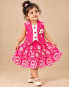Toddler girl embroidered crop top and pleated skirt set featuring floral threadwork and structured vest layer
